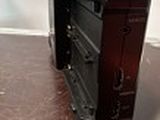 an image of a toaster sitting on a wooden table
