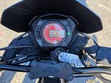 a close up view of a motorcycle ' s handlebars