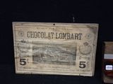 a box of chocolate sitting next to a box of chocolate