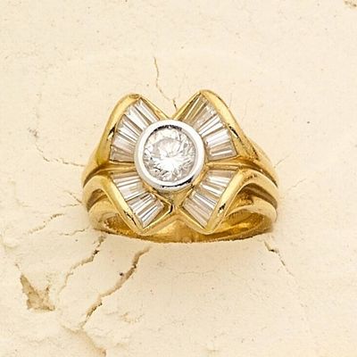 Bague en or 18k (750e), centrée d'un diamant brillanté en se…