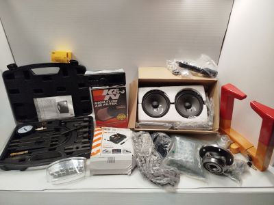 a box with speakers and other items on a table