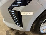 a close up of a car with a sticker on the front of it