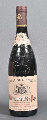 a bottle of wine that is sitting on a table