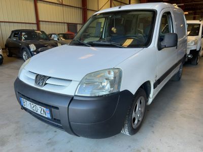 a white van that is parked in a garage