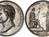 une image représentant une pièce d'argent sur laquelle figurent une femme et un homme