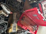 a lot of tools that are sitting on the floor