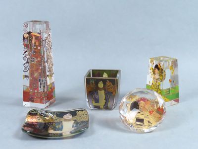 four different types of glass items on a white surface