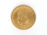 une pièce d'or sur laquelle est représentée une tête d'Indien