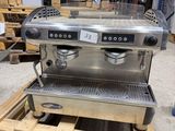 an image of a coffee machine sitting on top of a wooden pallet