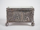 an antique silver box with a scene of a man and a woman in a forest