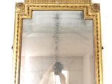 a person taking a picture of themselves in a mirror