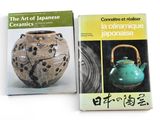 two books about ceramics and ceramics on a white surface