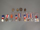 many medals and medals in the bag on the table