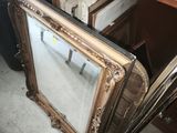 a picture of a picture frame and a bowl on a shelf