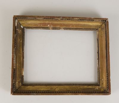 an old picture frame on a white surface with a white background