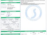 a green and white document with a barcode on it