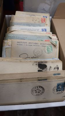 a lot of mails in a box on the table