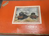 a picture of a picture of two trains on the cover of a book