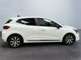 the white car is parked in a large room with a gray floor