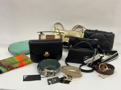 a lot of purses that are sitting on a table