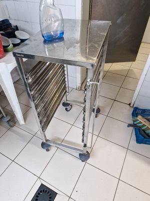 a table with a bottle of water on top of it