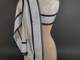 a close up of a mannequin torso with a scarf on it