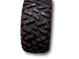 a close up of a tire on a white surface with a white background