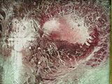 une photo d'une peinture représentant un cœur sur un mur