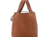 a brown handbag with two handles on a white background