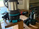 a picture of a vacuum on a workbench in a home office
