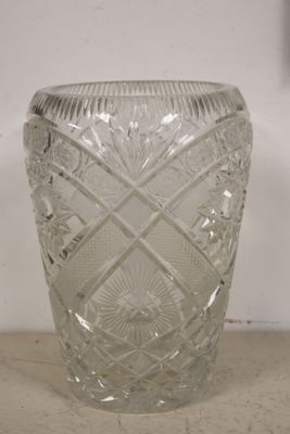 a glass vase that is sitting on a table