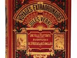 un livre rouge orné de lettres dorées et d'illustrations