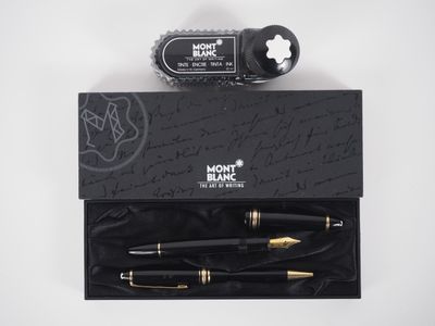 the mont blanc fountain pen and rollerball pen are in a black box