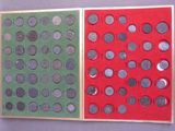 two pieces of paper with different designs on them on a table