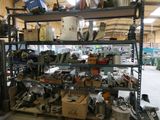 many different types of tools on the shelves in the warehouse