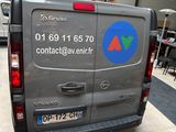 a van that is parked inside of a building