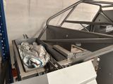 a lot of metal items that are sitting on the floor
