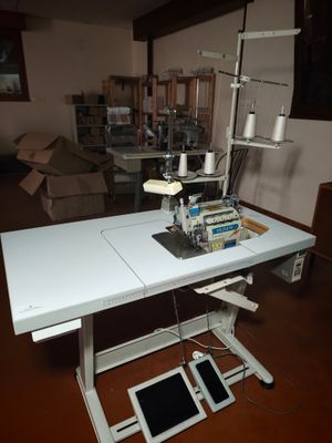 a sewing machine sitting on a table in a room