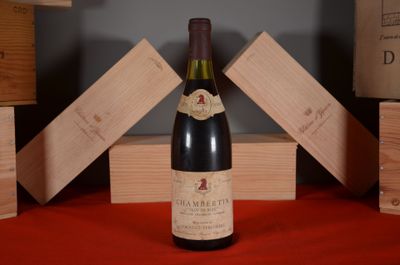 a bottle of wine that is sitting on a table
