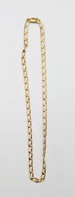 a close up of a chain on a white surface with a white background