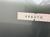 a close up of a sticker on the hood of a car