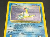 a pokemon card with a picture of a bird on it