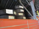 several tires stacked on top of each other in a warehouse