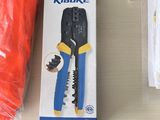 a pair of pliers and a pair of scissors on a table