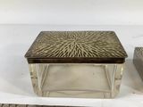 pair of silverplated glass boxes with a starburst design on the top