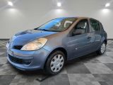 a picture of a small blue car in a room
