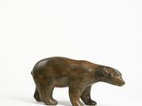 sculpture of a brown bear on a white background