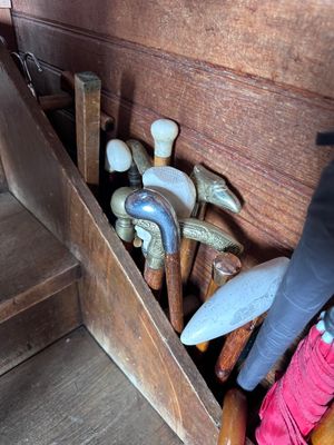 a wooden box filled with different types of tools