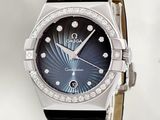 an image of a close up of a watch with diamonds on it