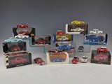 a lot of toy cars that are sitting on a table